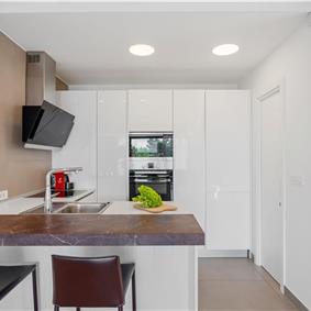 5 bedroom beachfront villa with heated pool near Omis, sleeps 9